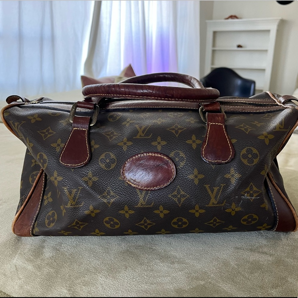 Louis Vuitton purse/small travel bag.